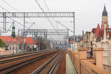 A four-track railway line running from Krak&oacute;w Grzeg&oacute;rzki station toward Krak&oacute;w Gł&oacute;wny station (visible in the background), passing through the historic center of Krak&oacute;w.