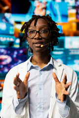 Healthcare researcher presenting disease prevention research medical data to audience at event....