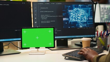 Admin writing code on isolated screen tablet, developing machine learning APIs. IT specialist using...