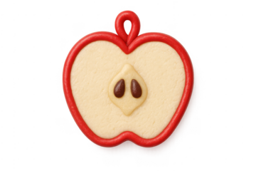 Clay apple slice showing fruit seeds transparent background