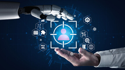 A human hand and a robotic hand are poised for interaction, symbolizing the intersection of humanity and technology in a digital age, showcasing innovation. Gantry