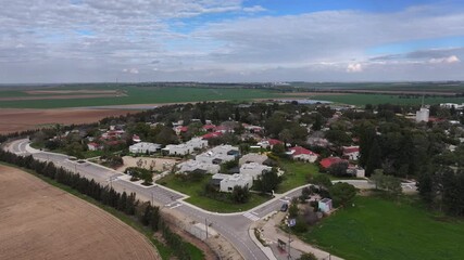 Drone Footage Kfar Aza Village Israel

Drone footage showing an aerial view of Kfar Aza village near the Gaza border, residential homes and surrounding farmland, 23. November 2023, Israel.
