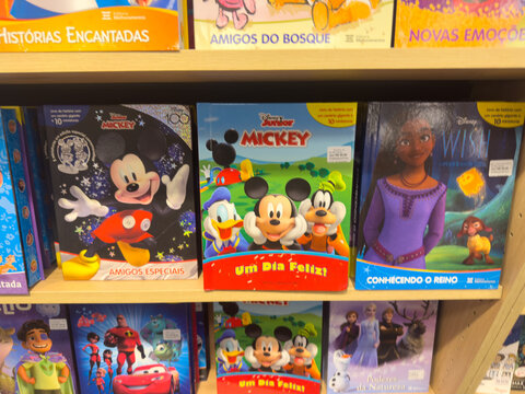 BELO HORIZONTE, MG, BRAZIL &ndash; DECEMBER 12, 2025: Children's books featuring Disney characters like Mickey Mouse and Frozen on display in a bookstore.