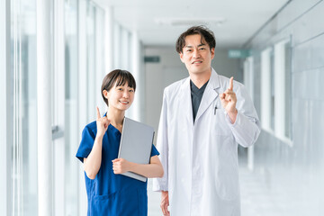 Medical workers in scrubs, medical staff, female nurses and male doctors in white coats