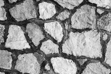 Close up of black and white native stone masonry and texture at the historic Stewart Indian School in Carson City, NV, U.S.A