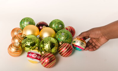 Round Christmas ornaments in red, green, and gold arranged on a white background.
Ideal for holiday backgrounds, seasonal design, festive marketing, and winter decor concepts.
JPG file.