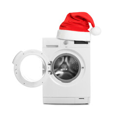 Washing machine with Santa hat isolated on white