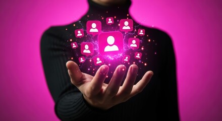 Hand holding glowing social media user icons with electrical current on a magenta background