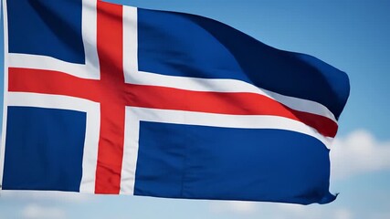 The vibrant blue white and red national flag of Iceland proudly waves in the gentle breeze against a clear bright blue sky with soft white clouds symbolizing the nations rich heritage and independent.