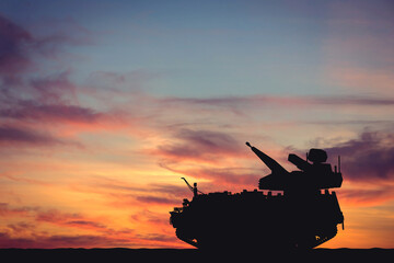 Silhouette of air defense against the backdrop of sunset. Modern air defense. Suitable for designs related to air defense, military operations, security, and technology in warfare.