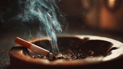 Close-up of a smoldering cigarette in a wooden ashtray, with wisps of smoke rising against a blurred, warm-toned background