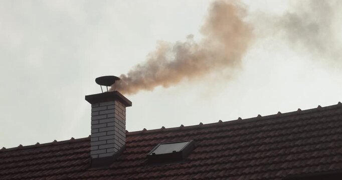 Smoking Chimney on a Roof