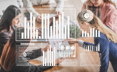 A dynamic marketing strategy meeting captures professionals analyzing data visualizations and collaborating on innovative ideas in a modern office environment. Impute