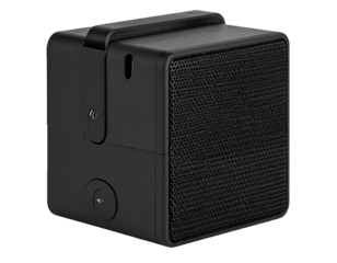 Black, cube-shaped tech device with handle and textured front