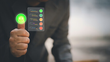 Businessman using smartphone to give five-star rating and positive feedback through virtual interface. Concept of customer satisfaction, user experience, review system, and digital feedback.