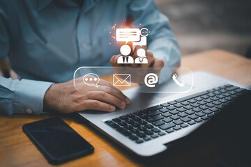 Businessman using Smart Phone with the email, call phone, address, Chat message icons.Customer support hotline Contact us people connection.