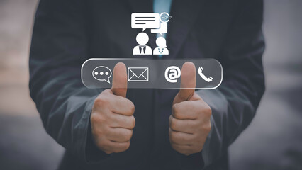 Businessman using Smart Phone with the email, call phone, address, Chat message icons.Customer support hotline Contact us people connection.