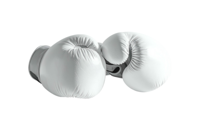 Two white leather boxing gloves, isolated against a dark background, in a close-up, studio shot