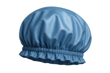 Blue shower cap for showering or bathing, protecting hair during personal hygiene and care on transparent background