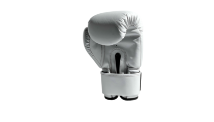 A white leather boxing glove against a black background, lit with dramatic shadows