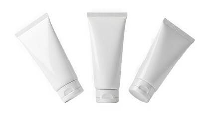 Three white cosmetic tubes on white background isolated on transparent background