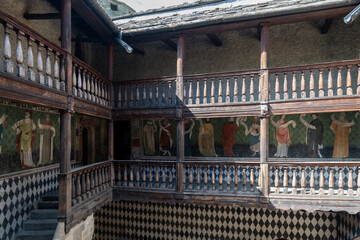 Fototapeta premium Inner courtyard frescoes at Fénis Castle - Fenis, Italy