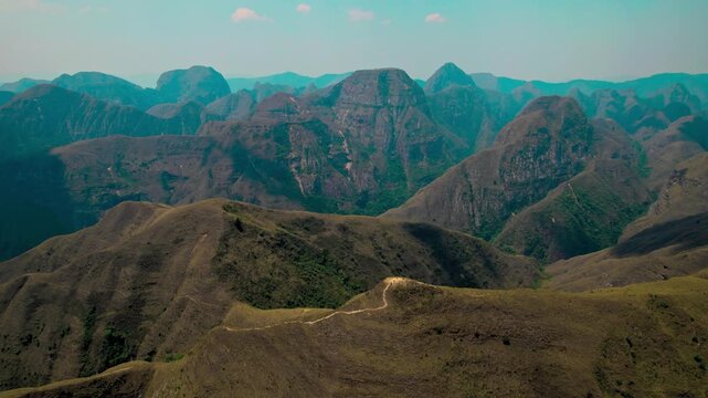 Wide-angle footage capturing the majestic and rugged Codo de los Andes, a unique geographical point in Santa Cruz, Bolivia, where the Andean mountains abruptly change direction.