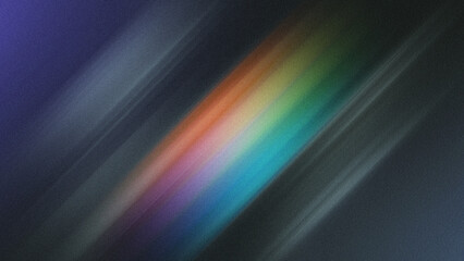 Vibrant rainbow light beam on dark background