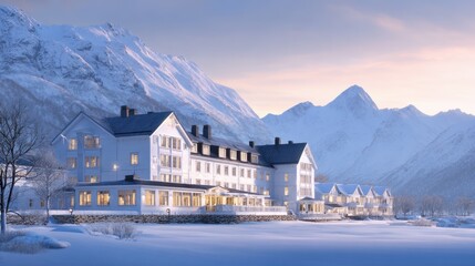Snow-draped alpine resort with lit windowsill along a frozen lake, majestic mountains loom in distance at dusk