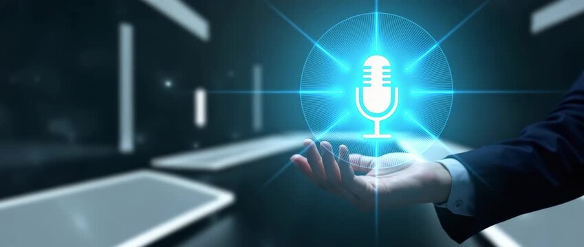 A hand presents a glowing microphone icon in a sleek, futuristic space; gentle ambient light flickers as the camera slowly pans, creating a cinematic, technology-focused atmosphere.