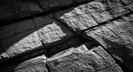 Close-up view of fractured stone.  Intricate patterns of light and shadow