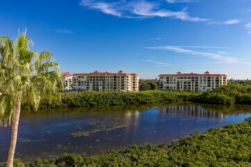 Fototapeta premium Waterfront condominiums overlooking mangrove bay in Florida