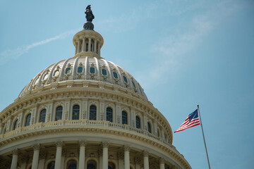 Iconic Congress under a clear sky. Congress is the historic symbol of American democracy. Congress in Washington, DC. The Capitol dome rising over Capitol Hill. Washington DC skyline near Congress.