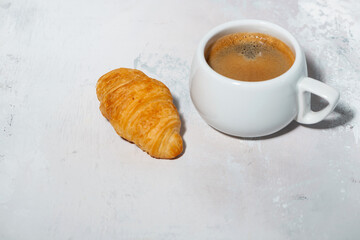 espresso and fresh croissant