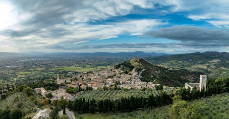An aerial view of Assisi Rocca Minore and Maggiore, medieval town with city walls in Umbria Italy