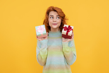 Gift for valentines day. Holidays, gift celebration and women concept. Portrait of happy girl celebrating birthday and receive gift presents. Woman holding gift isolated background.