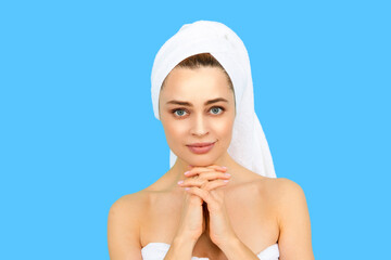 Woman face with towel on head. Clean skin face, facial care. Fresh and clear skin, face care routine. Woman skincare. Beauty face cosmetology. Perfect skin of beauty girl. Beauty and spa cosmetics.