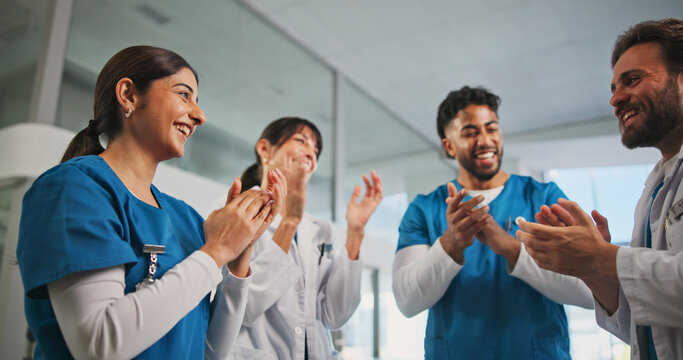Doctors, group of people and applause for support, thank you and success in hospital. Nurses, medical professionals and men clapping hands for clinic achievement, collaboration and celebration