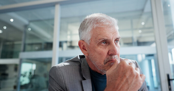 Thinking, doubt and mature businessman in office for decision, reflection or memory in finance career. Planning, professional and male financial manager with unsure choice for job in workplace.