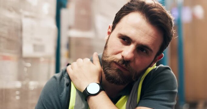 Businessman, shoulder pain and warehouse with injury for overworked strain or pressure in storage. Man, distributor or packer with sore ache or accident for muscle tension or discomfort in depot