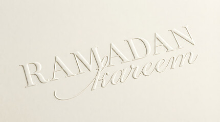 Ramadan Kareem embossed text on a light background.
