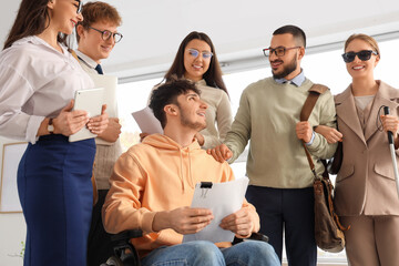 Job applicants with blind woman and man in wheelchair at office