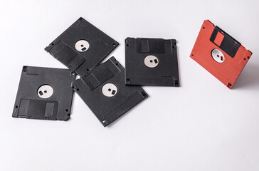 Black and red 3.5 inch floppy disks isolated on white background