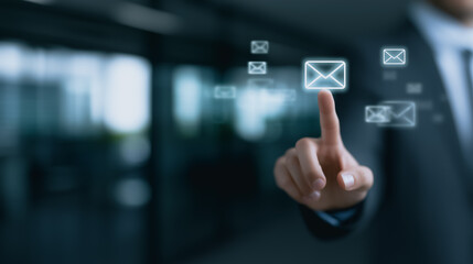 A businessman in a tailored suit interacts with a modern email interface, symbolizing digital communication, and connectivity, with a blurred backdrop of an office.