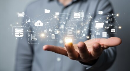 Data Management Concept: Businessman Holding Digital Data Icons, Cloud Computing, and Secure Information Technology