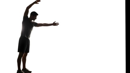 Man Silhouetted Against White Background Throwing.