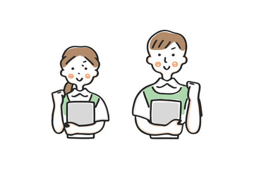 ガッツポーズをするエプロン姿の男女