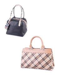 A small handbag with a textured front flap, a short shoulder strap, and a butterfly-shaped metal detail on the front.	
