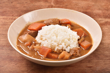 Pork curry with rice in a bowl