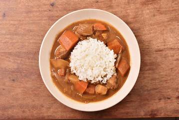 Pork curry with rice in a bowl